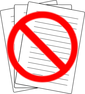 loose papers with a accessible negative symbol stamped over them